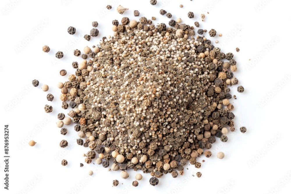 A close-up shot of a pile of pepper seeds on a white surface A close-up shot of a pile of pepper seeds on a white surface