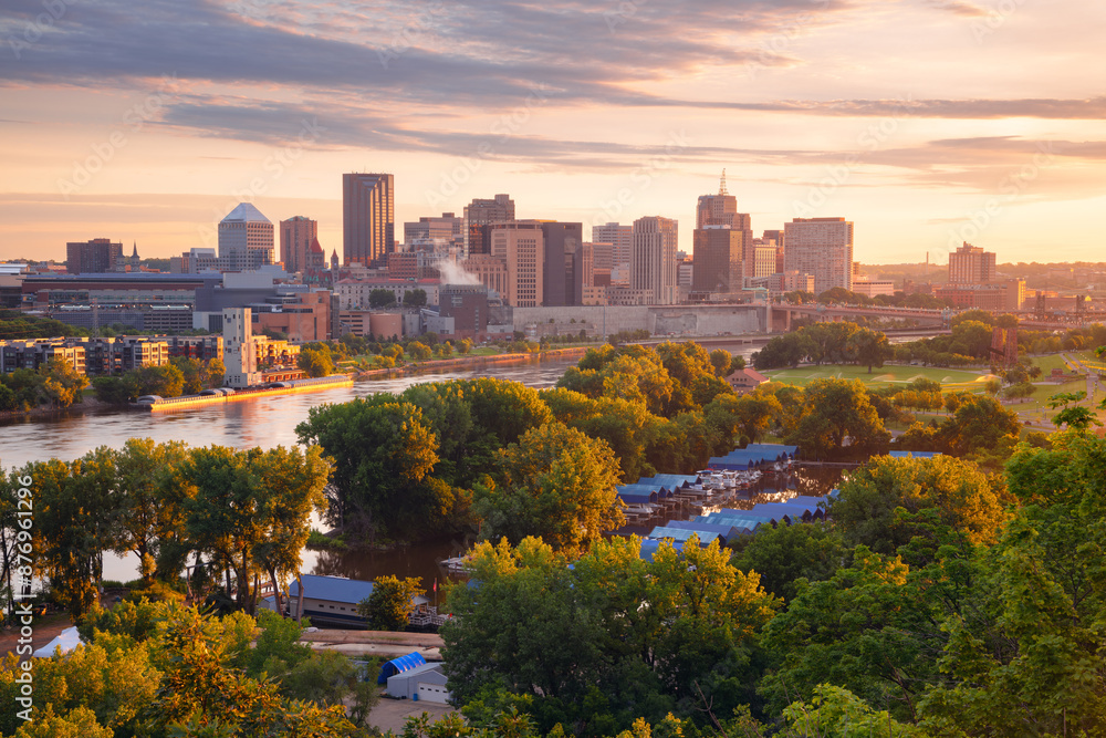 Saint Paul, Minnesota, USA. Aerial cityscape image of downtown St. Paul, Minnesota, USA with reflection of the skyline in Mississippi River at beautiful summer sunrise.