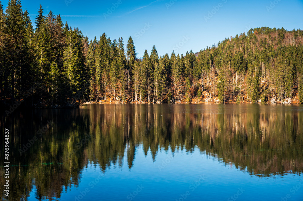 Morning in the Fusine lakes valley. Autumn reflections. Morning in the Fusine lakes valley. Autumn reflections.