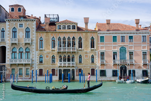 A gondola entering the Grand Canal seen from the Basilica of Santa Maria della Salute, Venice, UNESCO World Heritage Site, Veneto, Italy, Europe