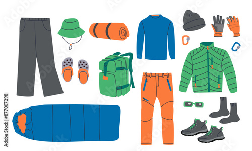 Hiking clothing for sport recreation touristic activity isolated on white background , camping outdoor pants ,shoes and sleeping bag for spring or summer and autumn seasons.