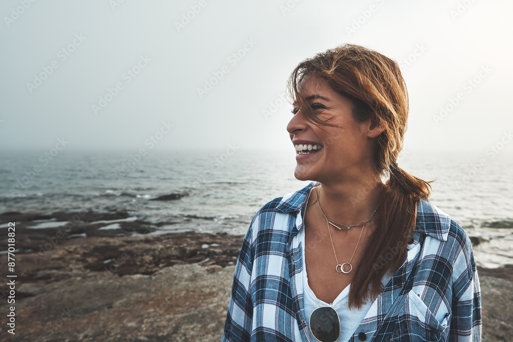 Face, laughing and smile with woman on beach for holiday, travel or mental health day in nature. Funny, sky and water with happy person outdoor on coast at ocean or sea for thinking or wellness Face, laughing and smile with woman on beach for holiday, travel or mental health day in nature. Funny, sky and water with happy person outdoor on coast at ocean or sea for thinking or wellness