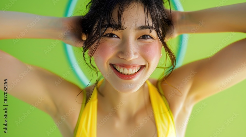Close-up of a Japanese woman hula hooping and smiling, wearing a yellow workout outfit, standing in front of a green background, Portrait close-up, hyper-realistic, high detail, photorealistic, Close-up of a Japanese woman hula hooping and smiling, wearing a yellow workout outfit, standing in front of a green background, Portrait close-up, hyper-realistic, high detail, photorealistic,