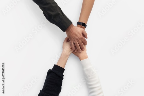 A group of people holding hands, a symbol of unity and solidarity