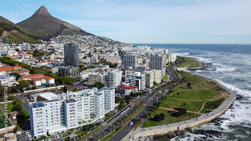 Sea Point Cape Town promenade and beachfront with Lions head in the background
