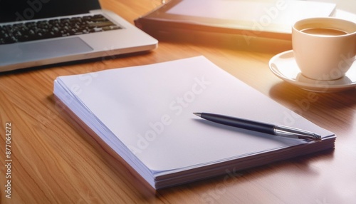 A mockup of a blank white paper sheet on a modern desk with a digital pen.