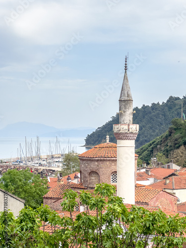 Streets and houses of Tirilye village, Historical old church in Trilye, view of the church converted into a mosque photo