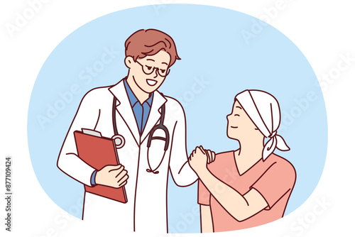 Doctor shakes hands with little cancer patient undergoing chemotherapy to fight cancer. Teenage boy with cancer lost his hair due to radiation exposure and needs support of clinic staff and parents