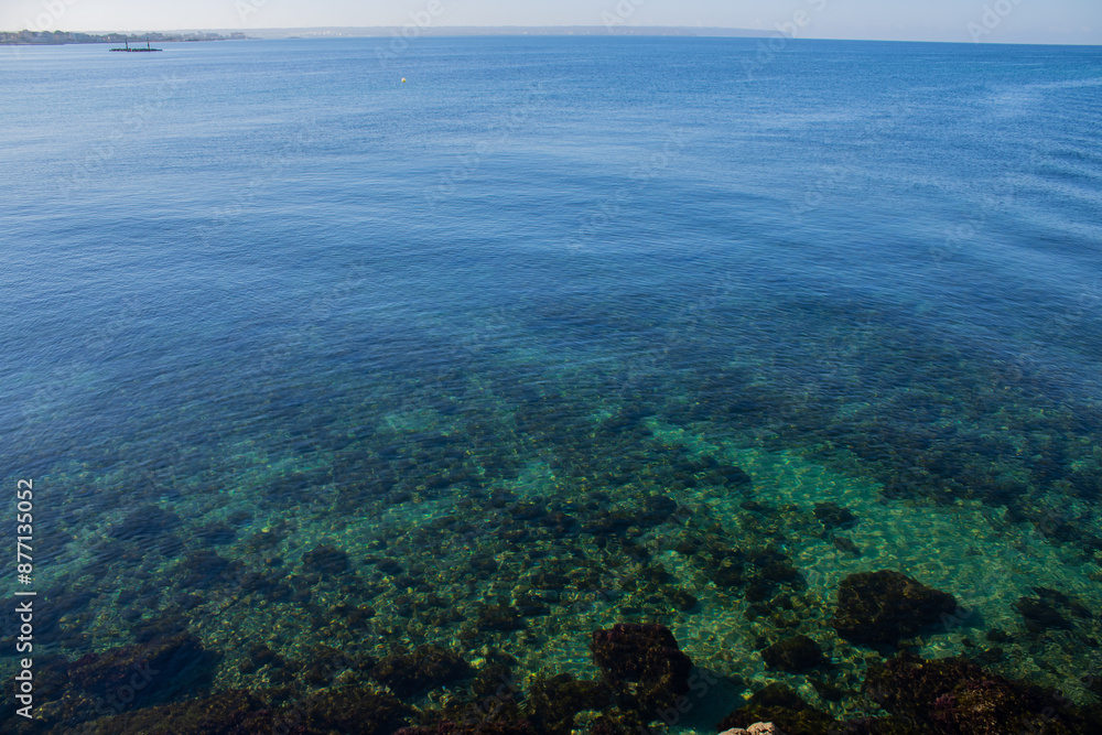 crystal clear water of the Mediterranean sea in summer with a sunny day in the morning crystal clear water of the Mediterranean sea in summer with a sunny day in the morning