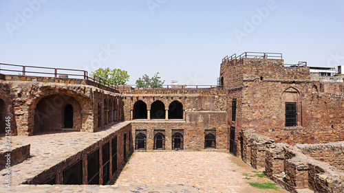 фотографія The ruined view of Firoz Shah Palace Complex, built by Firoz Shah Tughlaq in the 14th century, Hissar, Haryana, India