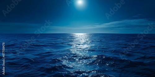 Ocean under moonlight vast and deep a canvas of midnight blue. Concept Romantic Beach Scenes, Moonlit Waters, Midnight Blue Aesthetics