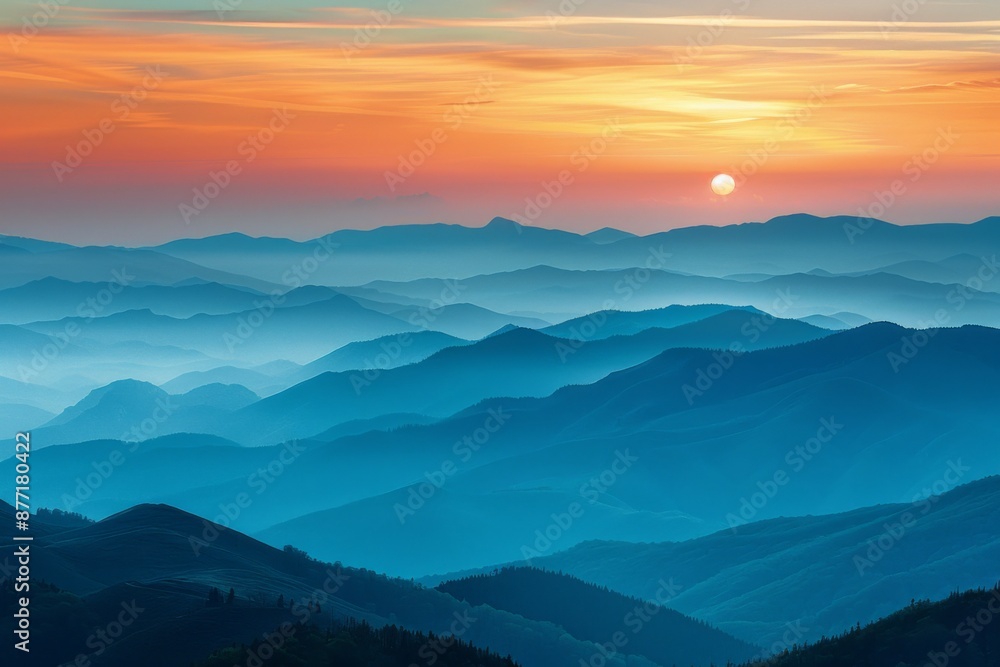 Obraz premium Serene Mountain Sunset Over Rolling Hills