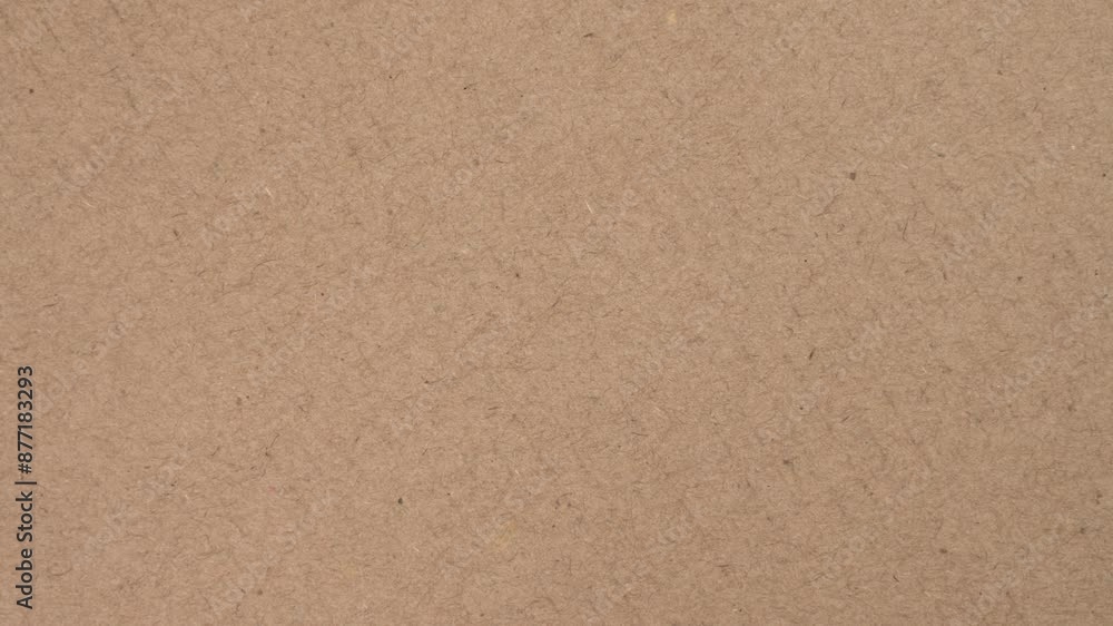 Cardboard sheet texture of recycled kraft brown paper box surface close up. Rotation Cardboard sheet texture of recycled kraft brown paper box surface close up. Rotation