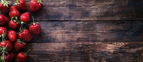 Strawberries placed on wood...