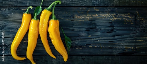 Yellow chili peppers arrang...