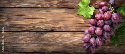 Grape placed on a wooden ta...