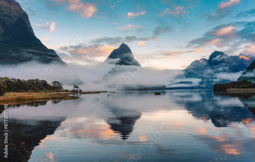 Milford Sound with Mitre peak and foggy on the lake at Fjordland national park, New Zealand photo