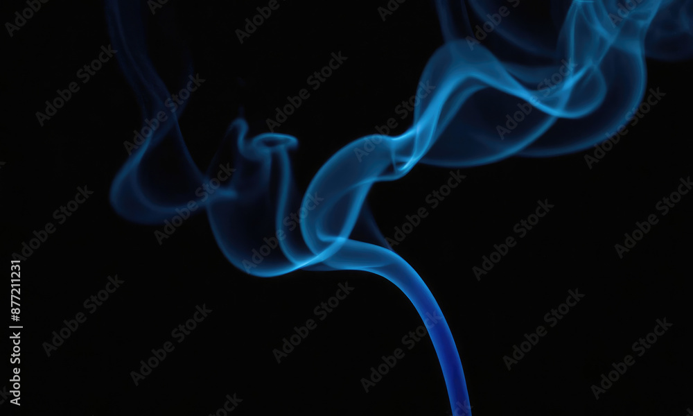 A beautiful stream of ethereal blue smoke rises gracefully against a dark background, creating a contrasting visual that evokes a sense of mystery and tranquil elegance. A beautiful stream of ethereal blue smoke rises gracefully against a dark background, creating a contrasting visual that evokes a sense of mystery and tranquil elegance.
