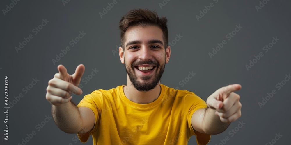 Naklejka premium Happy man portrait pointing to you for choice, decision, and vote for winner, volunteer, or recruiting on white background in studio. Support Indian model, grin, finger, emoji, and join us.
