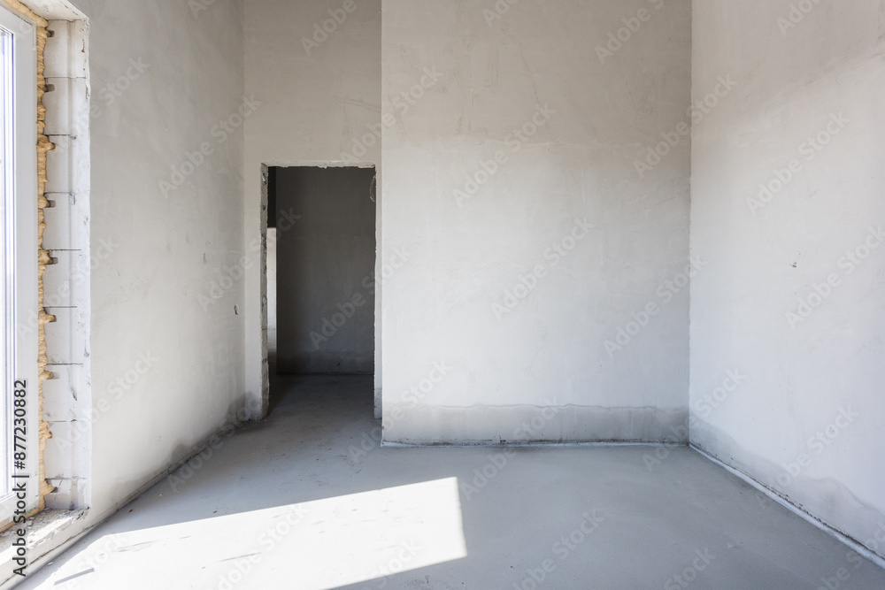 interior of the apartment without decoration in gray colors. rough finish interior of the apartment without decoration in gray colors. rough finish