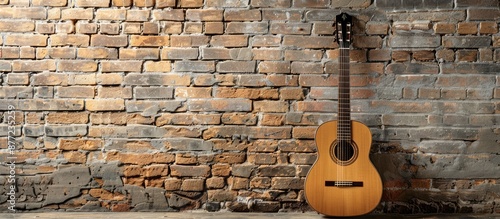 Acoustic guitar placed agai...