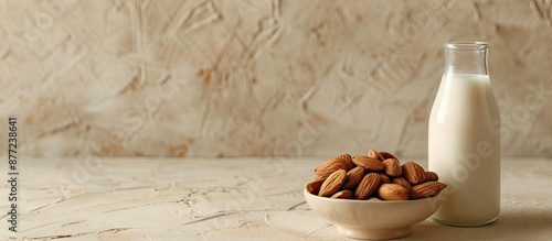 A bowl with almonds sits ne...