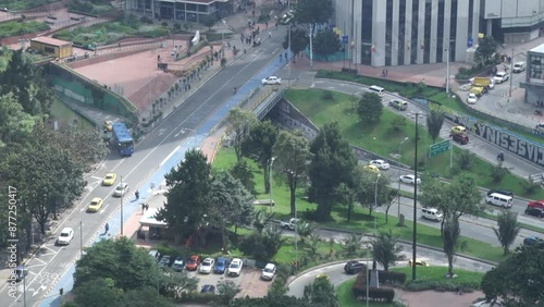 Carrera septima en la Ciudad de Bogotá, acompañado de muchos automoviles photo