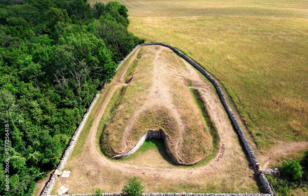 Belas Knap 5000 year Neolithic chambered long barrow near Winchcombe, UK. Cotswold Severn Cairn type. Showing burial chamber entrances and forecourt