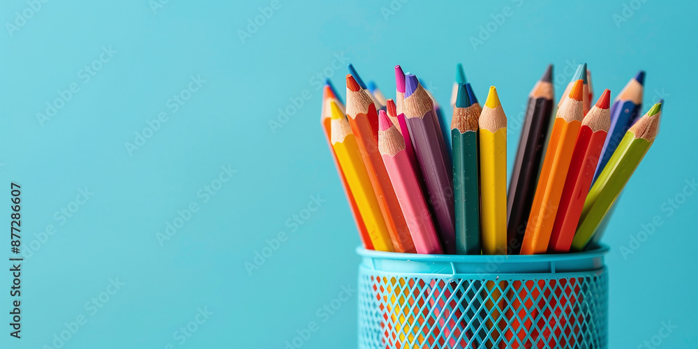 Fototapeta premium Colorful pencil stand with a set of pencils for drawing at school, promoting creativity in arts and crafts, art education concept