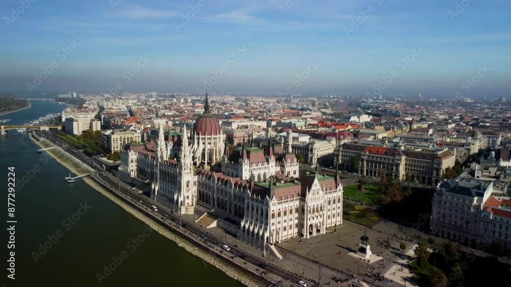 Aerial view of Budapest Parliament Building. Hungary Capital Cityscape at daytime. on the banks of the Danube River. Travel, tourism and European Political Landmark Destination. 4K Aerial view of Budapest Parliament Building. Hungary Capital Cityscape at daytime. on the banks of the Danube River. Travel, tourism and European Political Landmark Destination. 4K