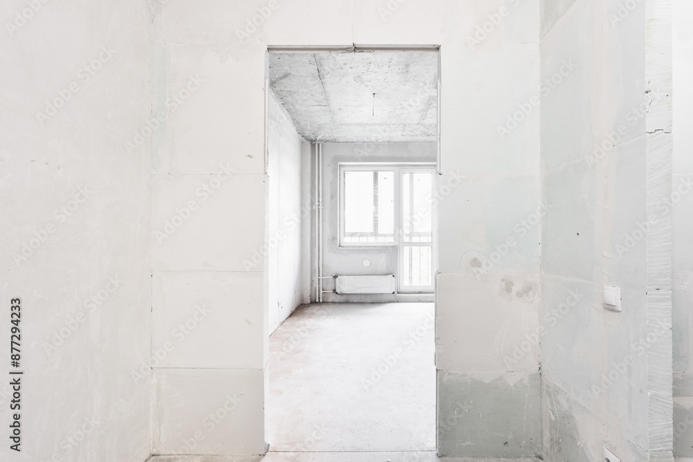 interior of the apartment without decoration in gray colors. rough finish interior of the apartment without decoration in gray colors. rough finish
