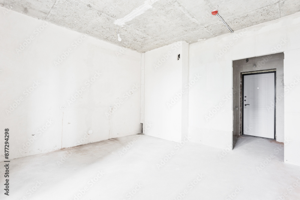 interior of the apartment without decoration in gray colors. rough finish interior of the apartment without decoration in gray colors. rough finish