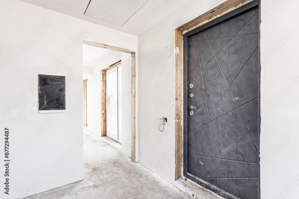interior of the apartment without decoration in gray colors. rough finish interior of the apartment without decoration in gray colors. rough finish
