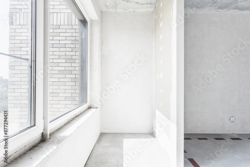 interior of the apartment without decoration in gray colors. rough finish