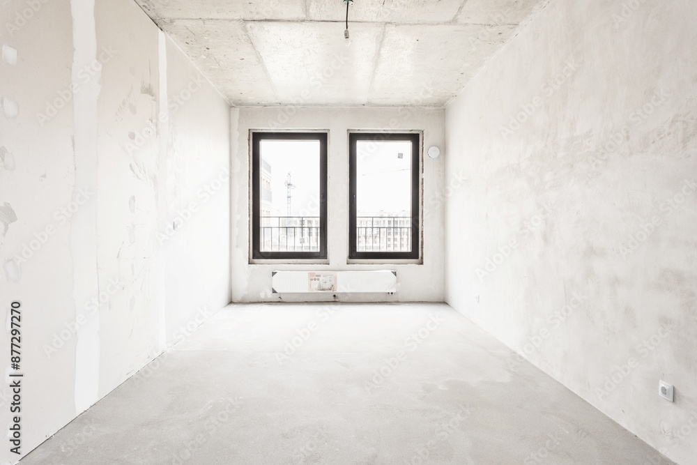 interior of the apartment without decoration in gray colors. rough finish interior of the apartment without decoration in gray colors. rough finish