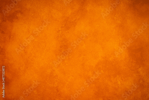 Closeup of a painted wall with different tones of orange