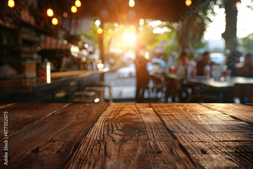 Defocused restaurant interior and empty wooden table space platform with a vintage vibe © Mark