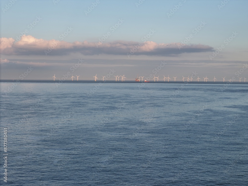 Obraz premium Offshore Wind farm Hemsby Norfolk UK drone,aerial at sunset