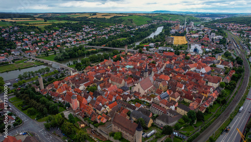 Aerial view of the old town of Ochsenfurt in Germany, on a cloudy day in late spring.