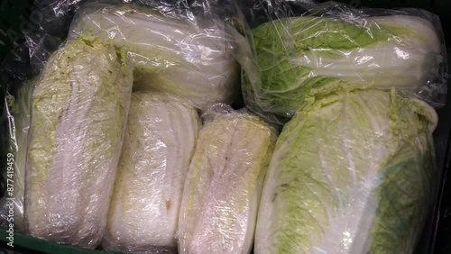 Chinese cabbage on a shelf in a supermarket photo
