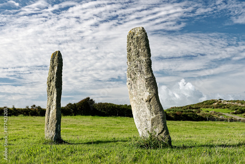Obraz na płótnie Penrhos Feilw prehistoric standing stone pair near Holyhead, Anglesey, Wales. 3m high. Neolithic or Bronze Age. View from N.E. w salonie