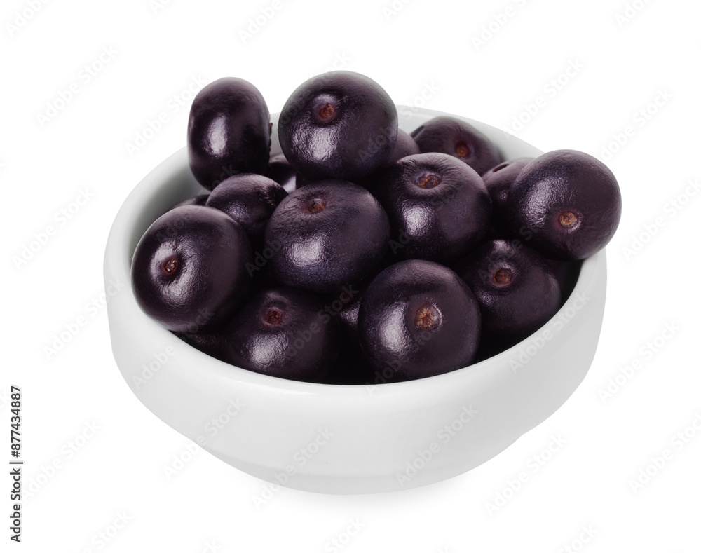 Fresh ripe acai berries in bowl isolated on white Fresh ripe acai berries in bowl isolated on white