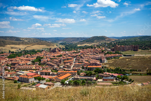 Generic view of the town of Sigüenza, Guadalajara, Castilla-la Mancha, Spain, with the cathedral of Santa María and the castle jutting out from the rooftops