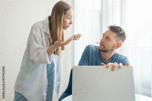 Photography Shocked woman caught her man watching pornography video and cheating with mistress on laptop at home