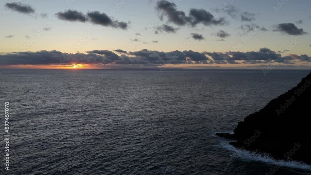 sunset over the ocean with an inspiring lighthouse sunset over the ocean with an inspiring lighthouse