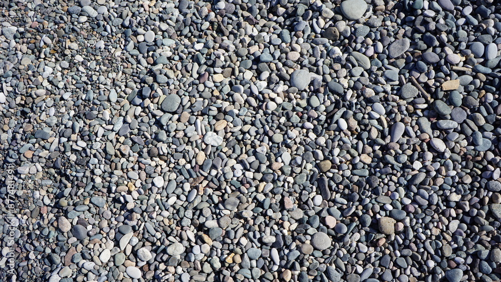 Sea pebbles background, grey stones, good texture Sea pebbles background, grey stones, good texture