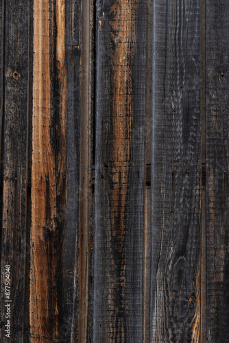 Background from untreated wooden planks. Wood texture for your photos. Vertical rustic background. © Alena