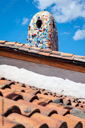 Very attractive and interesting chimney on a rooftop of an old house in Guapulo, Ecuador.