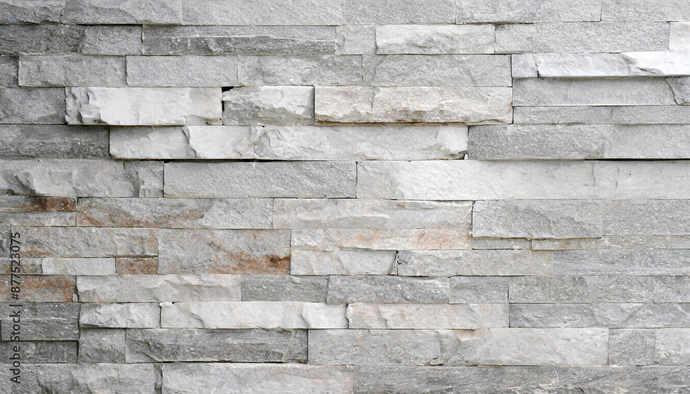 Stone wall texture background - grey stone siding with different sized stones Stone wall texture background - grey stone siding with different sized stones