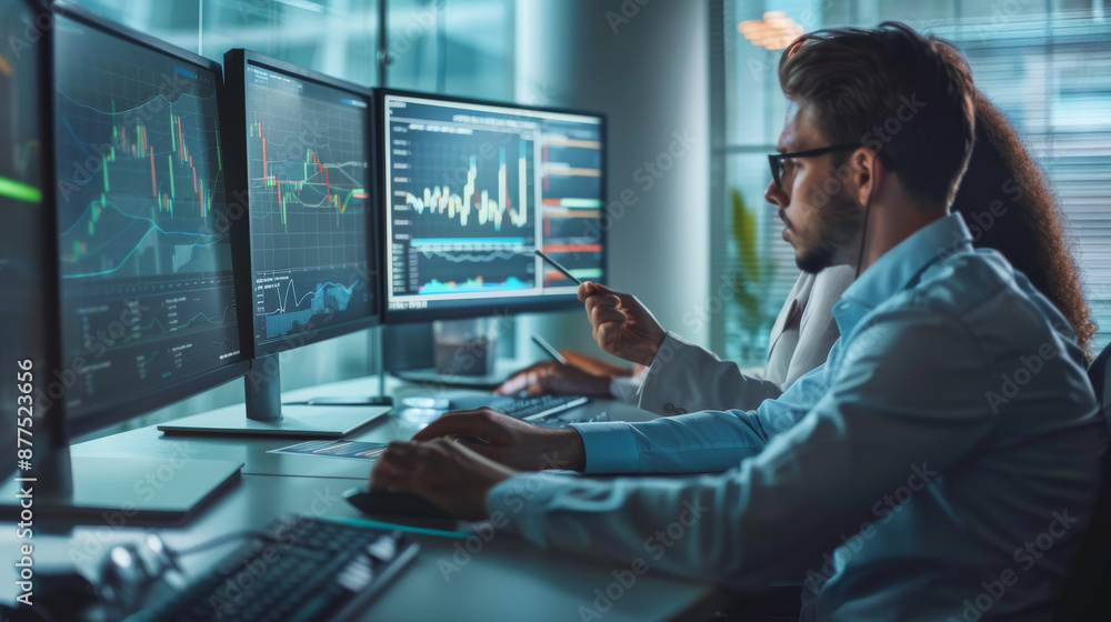 Professionals analyze data on multiple computer monitors in a modern, high-tech office environment. Professionals analyze data on multiple computer monitors in a modern, high-tech office environment.